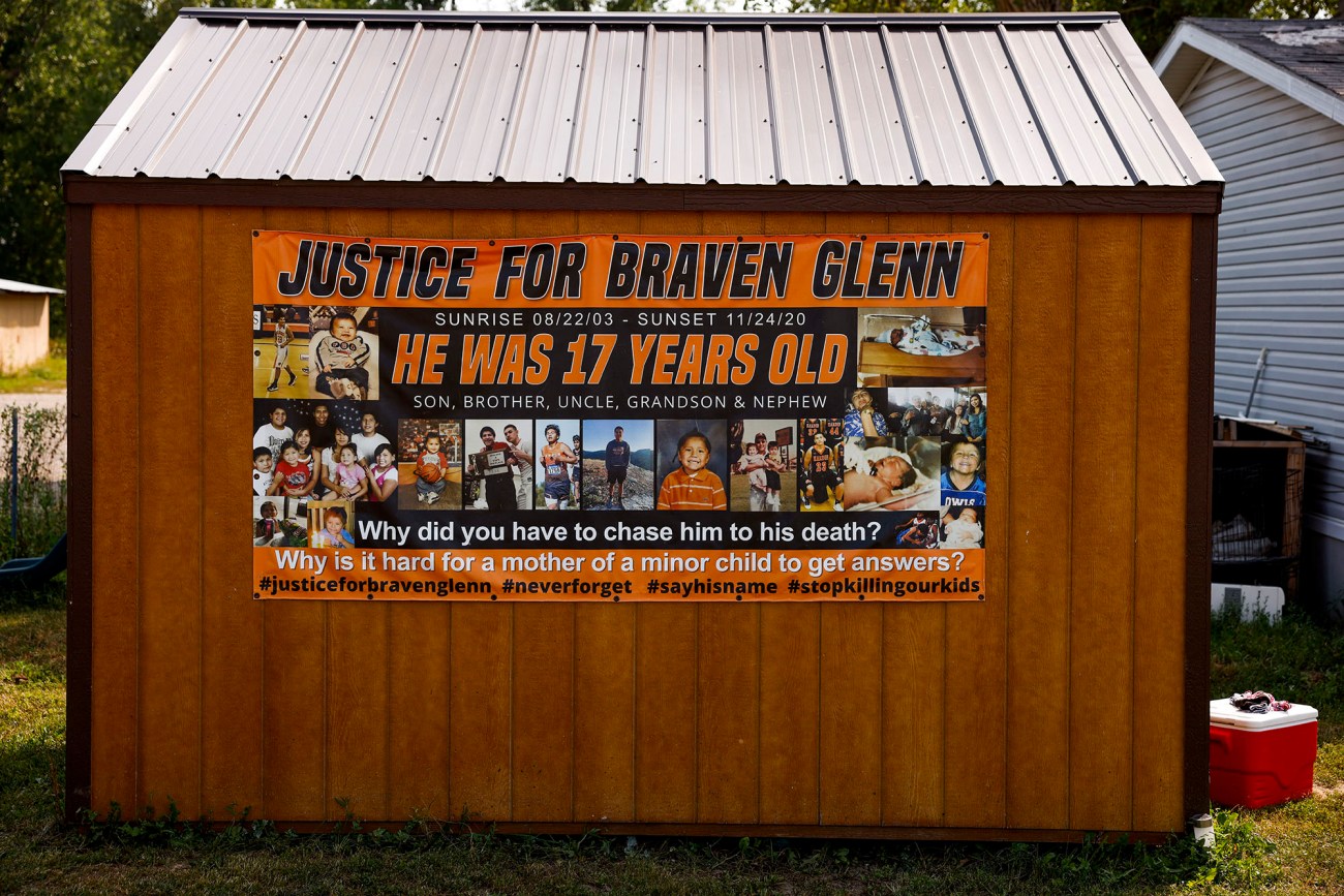 Banner hanging on a shed.