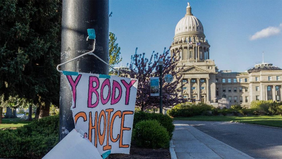 A sign that reads “My Body My Choice” is taped to a hanger. The hanger is placed near the Idaho Capitol in Boise after protests against the state’s abortion laws.