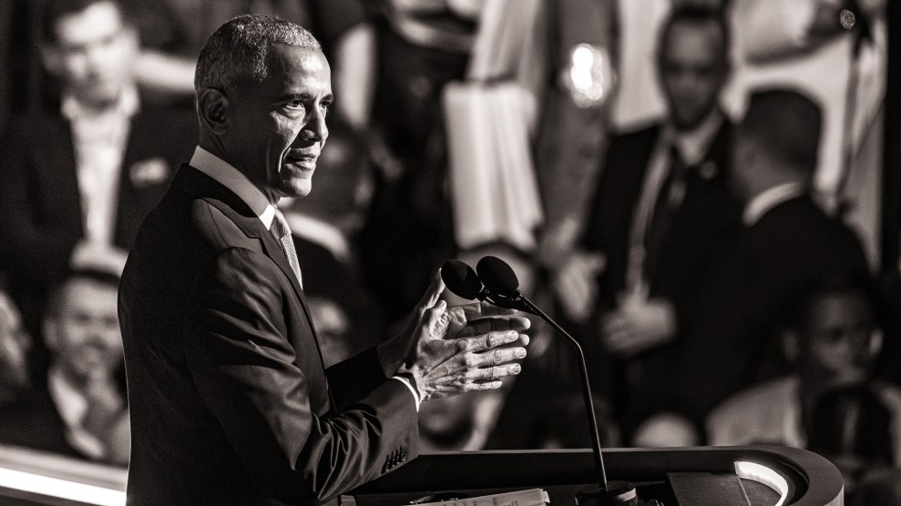 Black and white photo of former President Barack Obama speaking at the DNC.