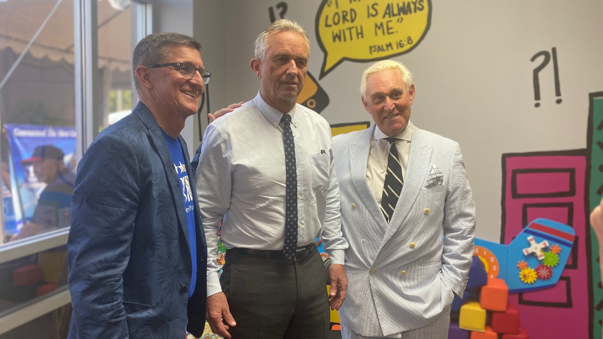 A photo of Robert F. Kennedy Jr. with Michael Flynn and Roger Stone