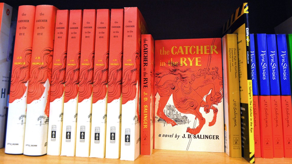 Copies of "The Catcher in the Rye" by author J.D. Salinger on the shelf at a bookstore.