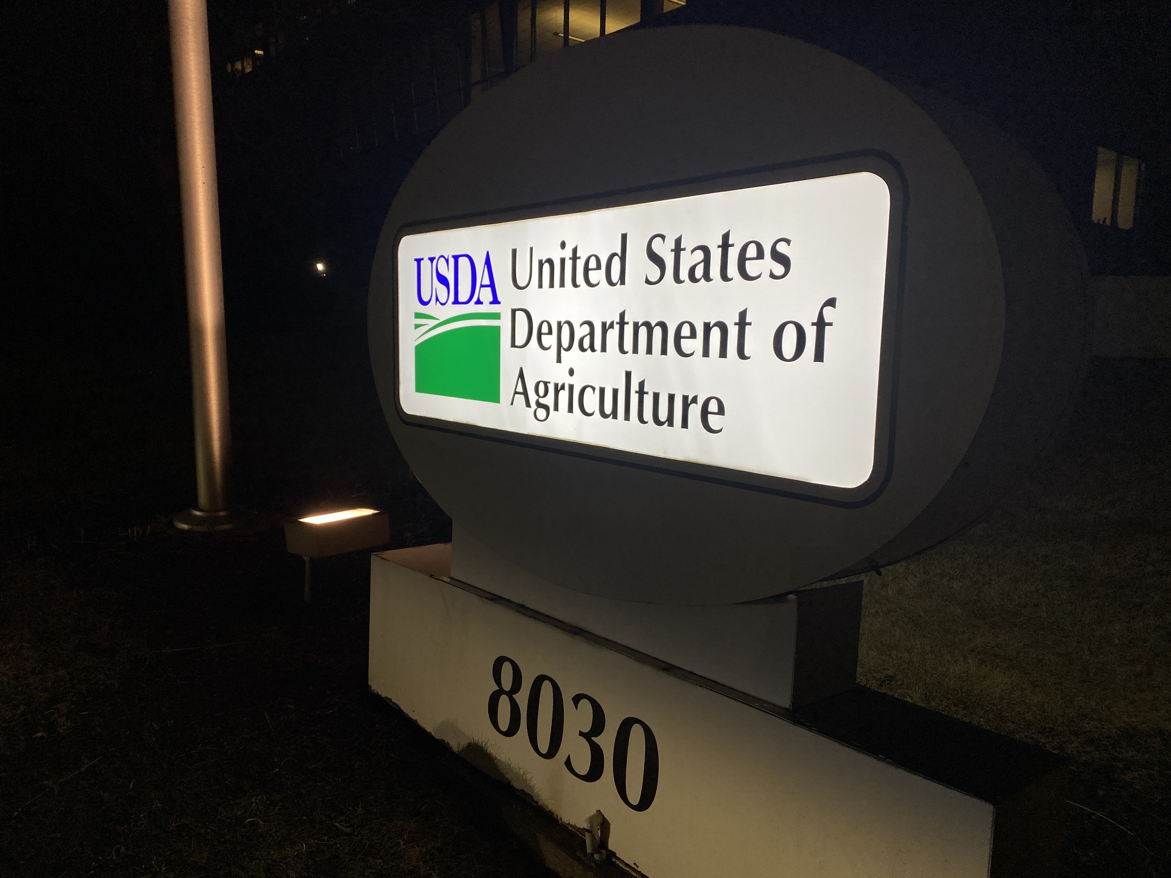 An illuminated sign says "United States Department of Agriculture."
