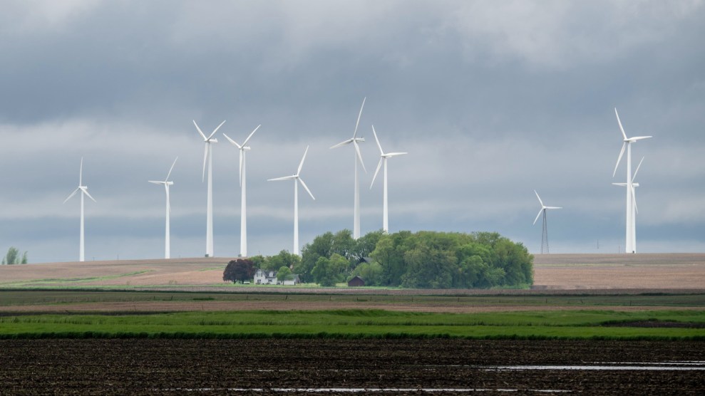 A photo of a handful of wind turbines in a field in Iowa