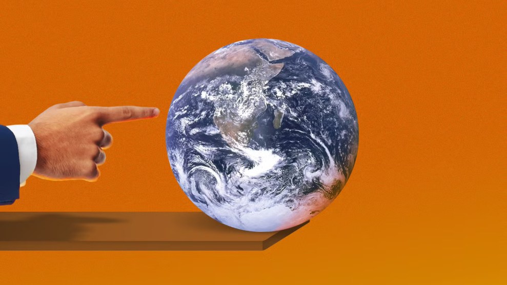 An earth and hand pointing to it on an orange background.