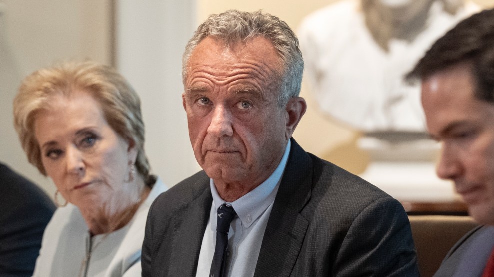 Linda McMahon, Robert Kennedy Jr, and Marco Rubio sitting in front of a marble bust.