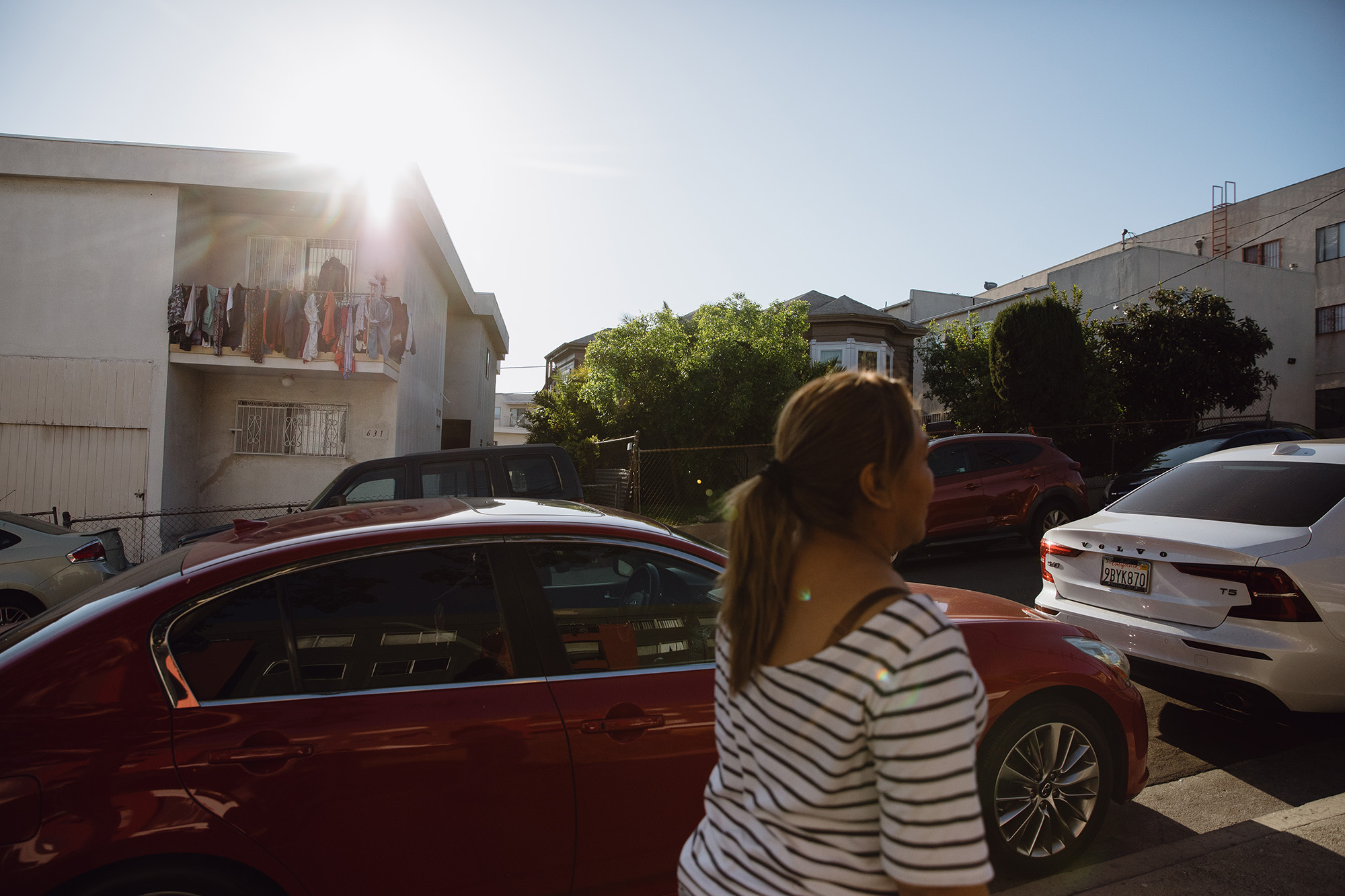 Woman walking down a street.