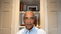 Barack Obama wears a blue collared shirt, and speaks during a live stream.