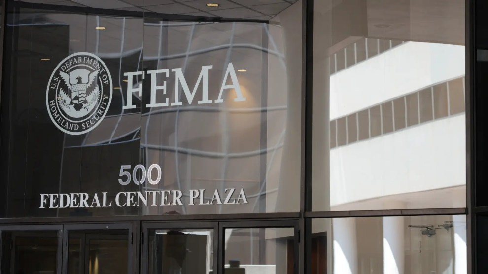 The FEMA logo on a glass window