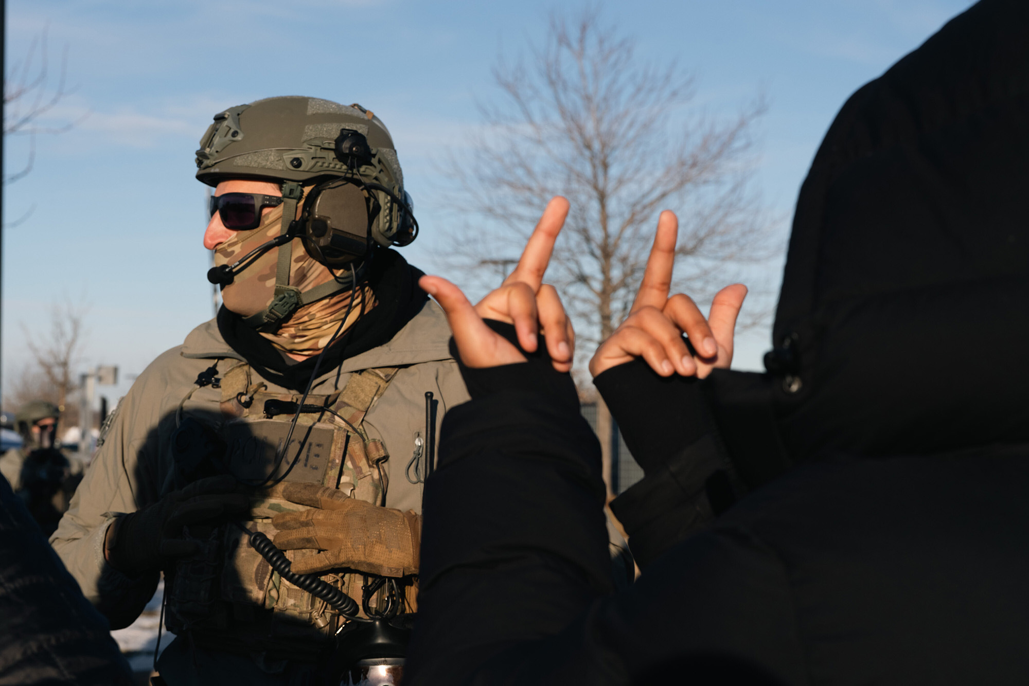 Person flipping off a federal agent.