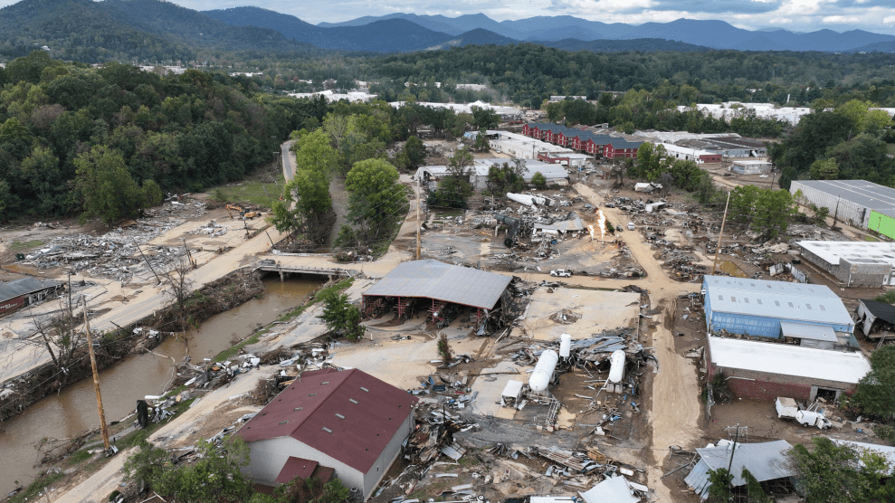 An aerial view of flooded, destroyed buildings.