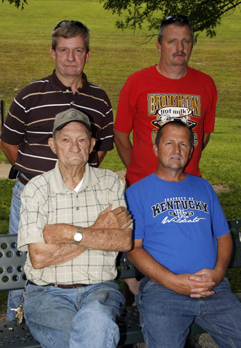 Retired Kentucky coal miner Ray Marcum (bottom left) and his sons (clockwise from top left) Thomas,  James, and Donald. All four have a form of black lung. Photo by Center for Public Integrity